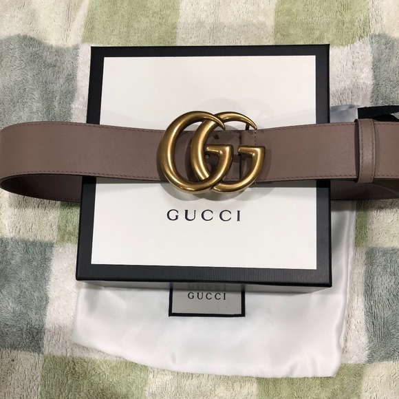 A leather belt with double G Buckle